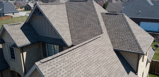 shingle roof on big house